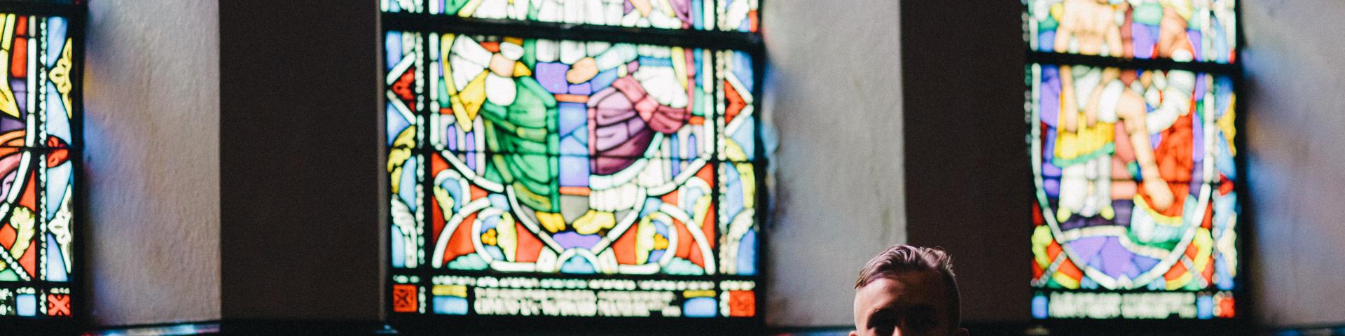 Picture of a young adult male in a church 