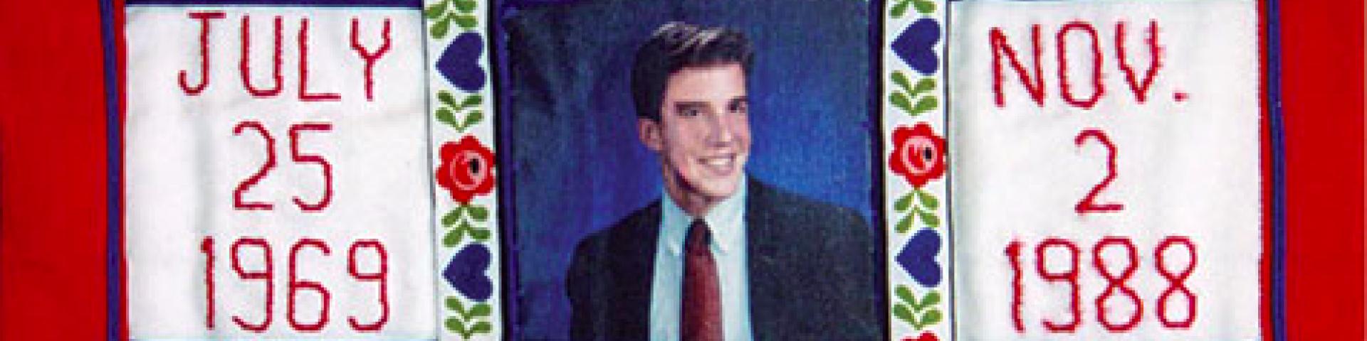 Quilt with a picture of Patrick Sean with his date of birth (July 25 1969) and the date he passed away (November 2nd 1899)