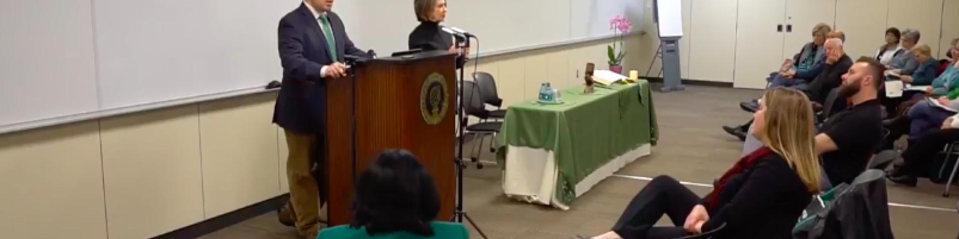 Picture of Miguel Romero giving a lecture 