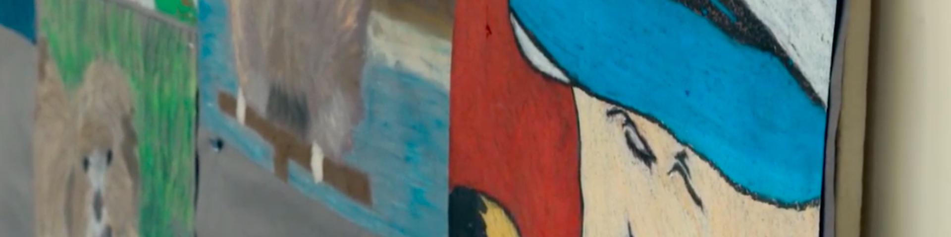 Picture of school bulletin board with art