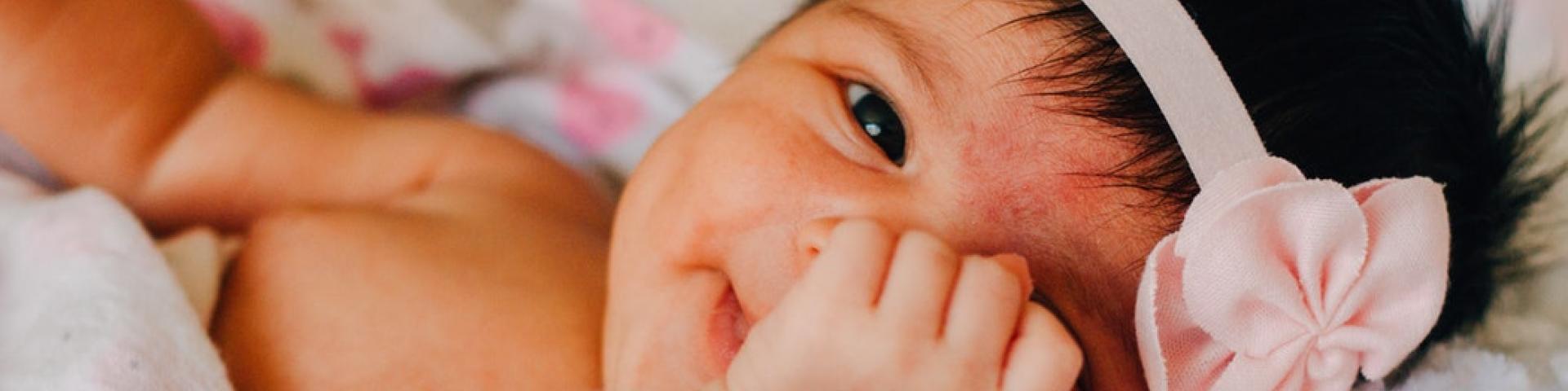 Picture of baby looking t the camera 