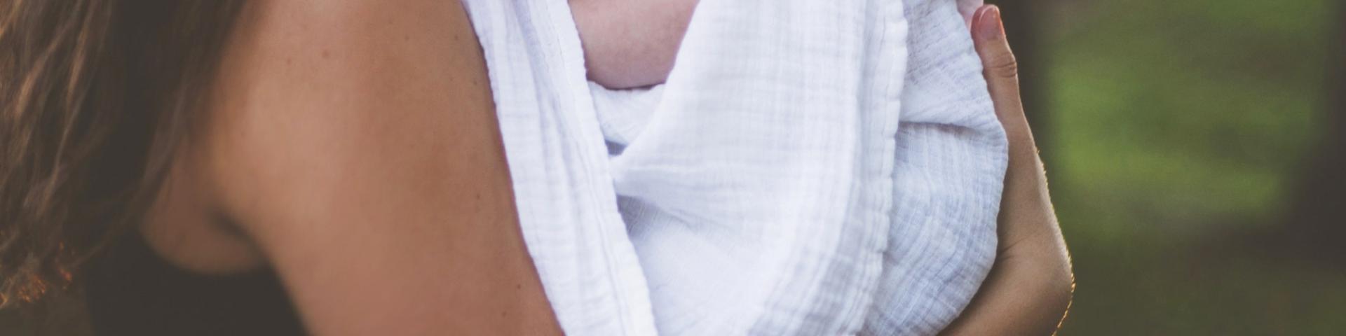 Mother holding her baby