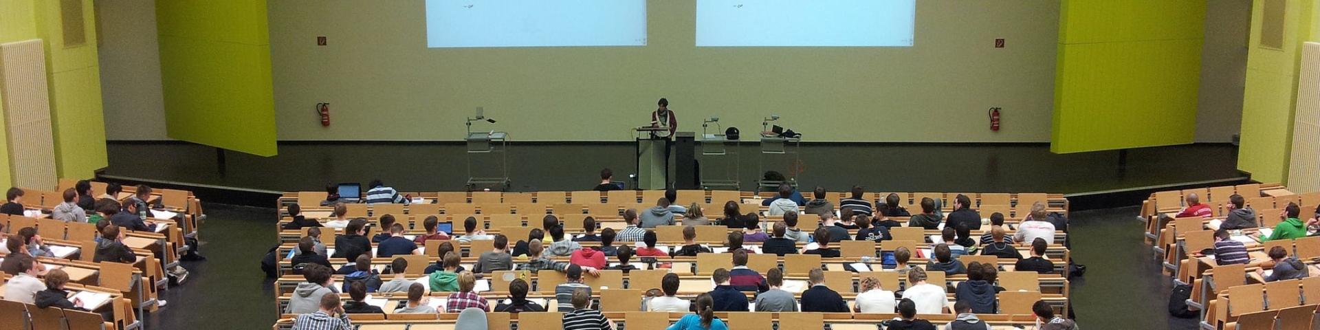 Lecture hall with students and professor