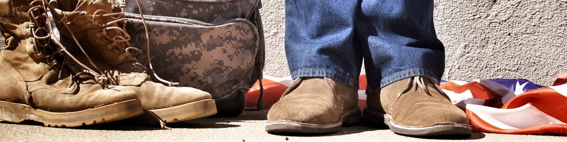 Veteran in jeans with is military gear 