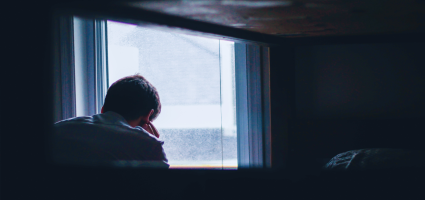 Person looking out the window