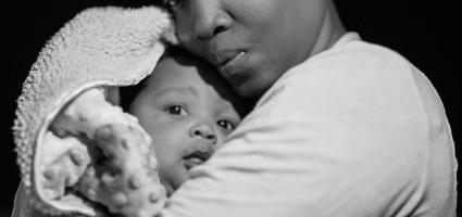 Mother holding her baby