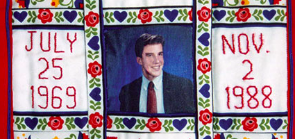 Quilt with a picture of Patrick Sean with his date of birth (July 25 1969) and the date he passed away (November 2nd 1899)