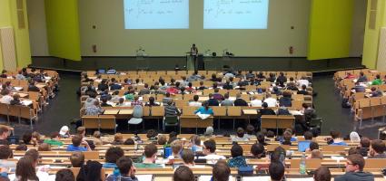 Lecture hall with students and professor
