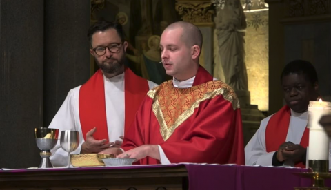 Fr. James Dennis celebrating Mass 