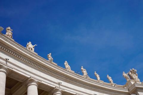 Vatican sculptures of saints with blue sky in the background