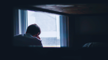 Person looking out the window 