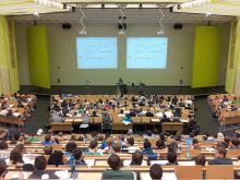 Lecture hall with students and professor