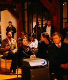 People listening to a presentation 